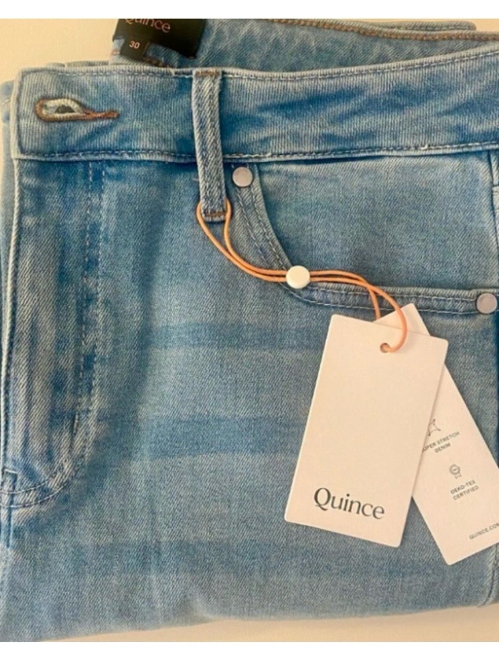 Bella Quince Women's Light Wash Jeans/ Tory Burch blouse
